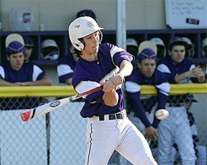 Quentin Tungate slaps a single for Oak Harbor against Everett Wednesday.