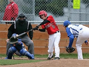 C.J. Smith bits the ball to the right side in Coupeville's win over La Conner Friday.