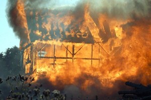 A barn owned by the Westerdyk family on East Crescent Harbor Road burns Thursday. The cause of the blaze is still unknown.
