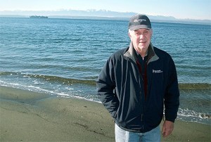 Gary Dunn enjoys a visit on a sunny Thursday to the Mutiny Bay beach that will soon come into public ownership. He’s building a house nearby and said he and others in the area would gladly volunteer to keep the beach clean.
