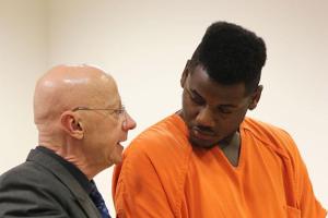 Larry Byars speaks with his attorney