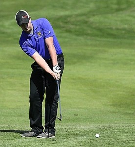 Caleb Brookshier fires a shot in Tuesday's Wesco North match in Oak Harbor.