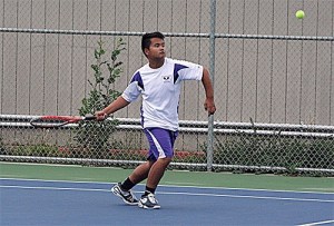 Oak Harbor's Raymond Paraiso prepares to return a shot in his 6-1