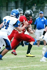 Latham Kelley runs for a big gainer against Chimacum last year.