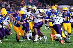 Princeton Lollar (32) rams through the Ferndale defense last fall.