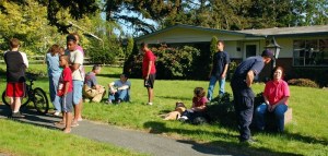 Homeowner Mary Geist talks to an emergency responder after a fire that destroyed her two storage buildings was extinguished. Geist