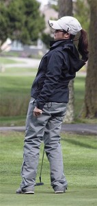 Oak Harbor's Bree Roderos uses some body language to influence a putt in the Wildcats' win Thursday.