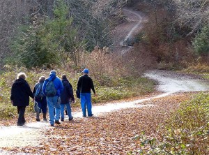 Hikers explore a property at Possession Point. The Whidbey Camano Land Trust recently received $1 million