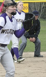 All eyes on the ball. Oak Harbor third baseman Tricia Sarns