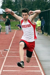 Coupeville's Mitchell Carroll jumps a personal best 35-07 in the triple jump Thursday.