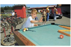 While grandmother shops at the Coupeville Lions Club garage sale Saturday