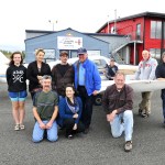 Photo by Michael Watkins/Whidbey News-Times                                Club members, owners and staff pose for a group photo in front of Cascade Aviation Saturday to celebrate its third year in business at the Skagit Regional Airport.
