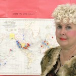 Executive director Lisa Bernhardt stands before a map showing where students and faculty of the Pacific Northwest Art School come from. The art school is celebrating its 30th anniversary with an auction Nov. 5. The art school is located at 15 NW Birch Street in Coupeville. Photo by Ron Newberry/Whidbey News-Times