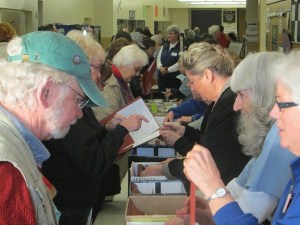 2013 Sound Waters participants make their way through registration. This year 65 classes will be offered for attendees to choose from.