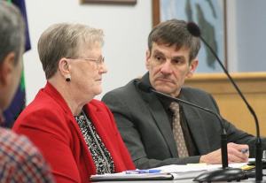 Washinton State Ferries Assistant Secretary Lynne Griffith explains her priorities for transportation to Island County Commissioner Rick Hannold with other county commissioners and civic leaders last week.