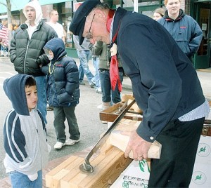 Elmer Veldheer has been the hit of Holland Happening for more than 20 years. This is his final year coming to Oak Harbor to carve wooden shoes by hand.