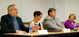 Oak Harbor City Council hopeful Paul Brewer responds to a question during the League of Women Voters of Whidbey Island’s primary forum at Skagit Valley College Thursday. Beside him from the left are fellow candidates Tara Hizon