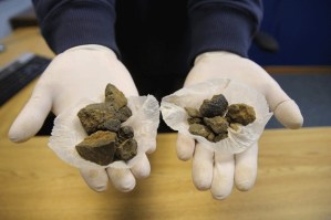 Detective Carl Seim with the Oak Harbor Police Department holds more than 74 grams of black-tar heroin he seized from a drug dealer. He said it’s worth about $5