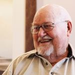 Harold Johnson of Oak Harbor enjoys songs from a group of children who visited Harbor Tower Village in Oak Harbor in 2015. Johnson, who survived the Japanese attacks on Pearl Harbor in 1941, died Friday, Oct. 14, 2016. He was 92. Photo by Ron Newberry/Whidbey News-Times