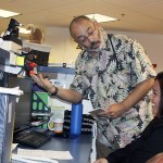 Photo by Ron Newberry/Whidbey News-Times                                Pediatrician Gabriel Barrio teases nurse Shaulana Lujan at Pediatric Associates of Whidbey Island last week. After 10 years at the Oak Harbor practice, the good-humored doctor left to take a position with an Othello clinic.
