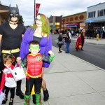 The Guerrero family poses for a photo while participating in the trick or treat event on Pioneer Way in Oak Harbor Monday. Photo by Michael Watkins/Whidbey News-Times