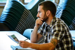 Sno-Isle Libraries offers a number of business classes throughout the year. Above, an attendee at a recent class at Coupeville Library takes notes on a presentation.