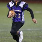 Ka&rsquo;imi Asinsin takes off on a long run for Oak Harbor. (Photo by John Fisken)