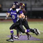 Tristin runs for one of his two TDs Saturday. (Photo by John Fisken)
