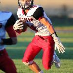 Smith sets records, but Wolves fall in finale / Football