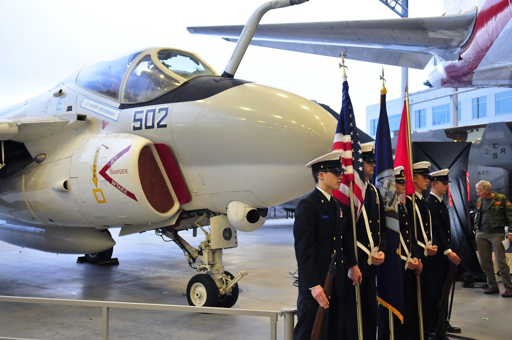 Members of the Oak Harbor High School NJROTC present the colors during an A-6 Intruder Tribute Memorial dedication ceremony at the Museum of Flight Friday in Seattle. Photo by Michael B. Watkins/ Whidbey News-Times