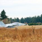 An EA-18G Growler practices touch-and-go landings at Outlying Field Coupeville.