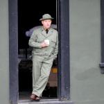 John McPherson enjoys an early morning cup of coffee prior to a day of giving living history tours at Fort Casey.