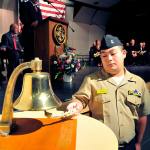 Oak Harbor High School NJROTC student John Bird conducts the striking of 11 bells to kick off the Oak Harbor Area Council Navy League Veteran&rsquo;s Day Program at Oak Harbor High School in Oak Harbor, Wash., Nov. 11, 2016. Photo by Michael Watkins/Whidbey News-Times