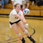 Claire Anderson reaches for a pass in a match this fall. (Photo courtesy of University of Bridgeport Athletics)
