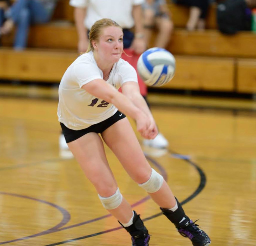 Claire Anderson reaches for a pass in a match this fall. (Photo courtesy of University of Bridgeport Athletics)