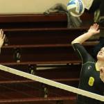 Roshel Donwen goes for the kill in a Pacific Lutheran volleyball match. (Photo courtesy of PLU Athletics)