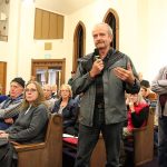 Photo by Jessie Stensland / Whidbey News-Times                                Central Whidbey resident Steve Swanson, a former emergency room doctor, talked about jet noise and how a potentially hazardous chemical that the Navy is testing wells for accumulates in the body over years. The public meeting was held Monday in Coupeville.