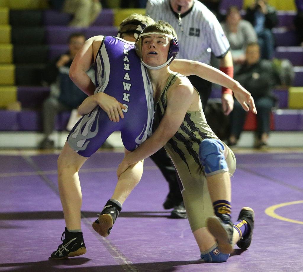 William Nickelson, right, is among a large group of returning letter winners for the Oak Harbor wrestling team. (Photo by John Fisken)