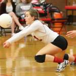 Valen Trujillo dives for a dig in Saturday&rsquo;s district tournament. (Photo by John Fisken)