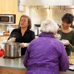 Hidemi Dettman and Sachie Sutterluety of Spin Cafe serve up soup at Oak Harbor United Methodist Church before a meeting on how to create an overnight emergency shelter for North Whidbey. About 150 people attended. The new shelter may open as early as Feb. 1.                                Photo by Patricia Guthrie/Whidbey News-Times