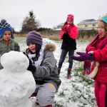 Photo by Michael Watkins/Whidbey News-Times                                Wyatt Waite, Grace Waite, Maggie Waite and Isabel Waite take advantage of the first snow of the season in Oak Harbor Friday. Meteorologists predicted the snow earlier in the week but it finally fell Thursday night into Friday morning. About two inches of snow fell on North Whidbey. Oak Harbor schools started two hours late and personnel at Naval Air Station Whidbey Island were asked to arrive two hours later than normal.