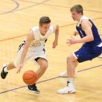Adam Nelson tries to beat a Sedro-Woolley defender off the dribble. (Photo by John Fisken)