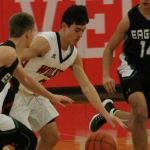Wolves snare first win, avenge earlier loss / Boys basketball