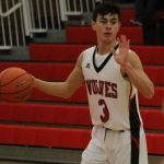 Wolves snare first win, avenge earlier loss / Boys basketball
