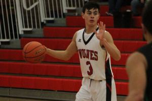 Wolves snare first win, avenge earlier loss / Boys basketball