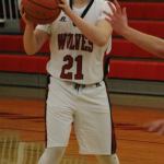 Ethan Spark looks to pass for Coupeville in Tuesday&rsquo;s game. (Photo by Jim Waller)