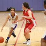Oak Harbor&rsquo;s Aleizah Espiritu tries to dribble by Snohomish&rsquo;s Sam Beeman. (Photo by John Fisken)