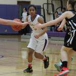 Rashanna Graham looks for an opening to attack the Cascade defense. (Photo by Jim Waller)