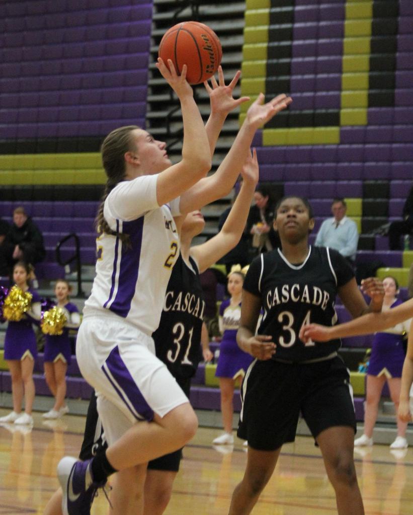 Julie Jansen puts up a shot for the Wildcats Tuesday. (Photo by Jim Waller)