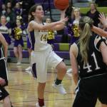 Bryn Langrock shoots a left-handed runner for Oak Harbor. The senior finished with 19 points to pace the Wildcat offense. (Photo by Jim Waller)
